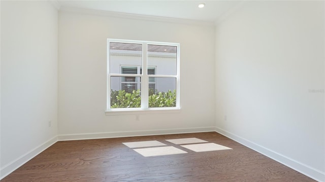 15722 San Lazzaro Ave, Lakewood Ranch, FL 34211 - spare room featuring recessed lighting, baseboards, ornamental molding, and wood finished floors