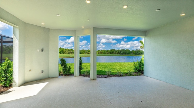 15722 San Lazzaro Ave, Lakewood Ranch, FL 34211 - view of patio featuring a lanai and a water view