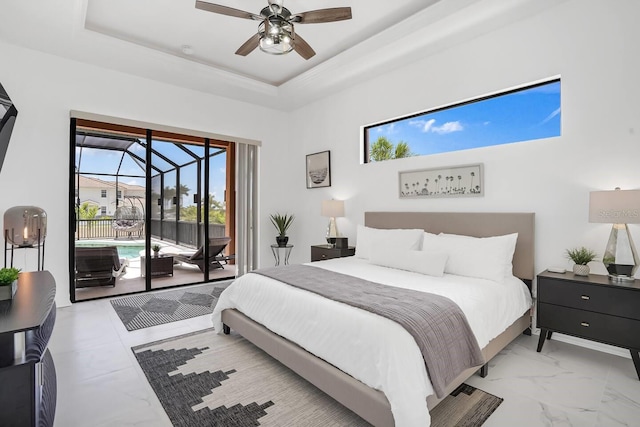 24017 Peppercorn Rd, Punta Gorda, FL 33955 - bedroom featuring a sunroom, a ceiling fan, a tray ceiling, access to exterior, and marble finish floor