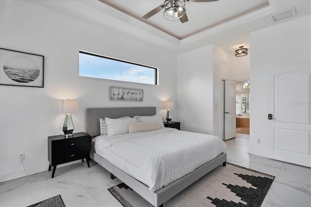 24017 Peppercorn Rd, Punta Gorda, FL 33955 - bedroom with visible vents, baseboards, a raised ceiling, connected bathroom, and marble finish floor