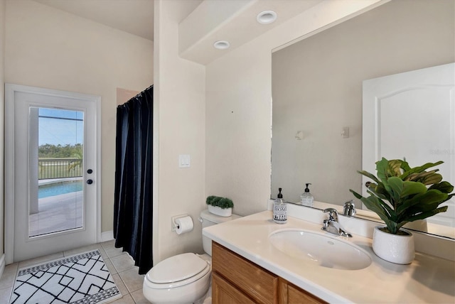 24017 Peppercorn Rd, Punta Gorda, FL 33955 - full bath with tile patterned floors, toilet, vanity, and a shower with curtain
