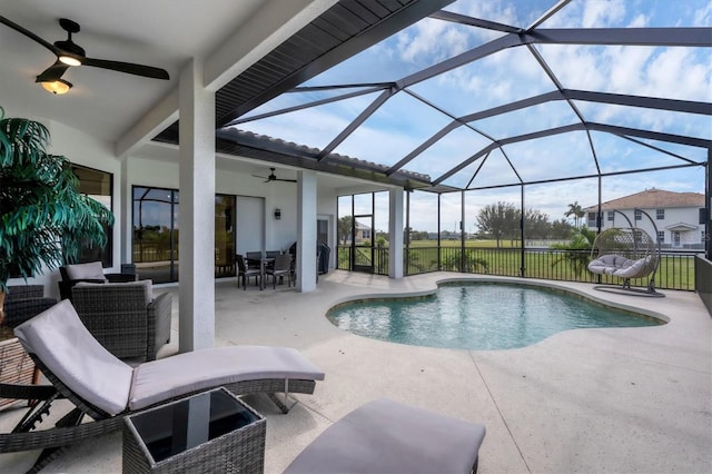 24017 Peppercorn Rd, Punta Gorda, FL 33955 - pool featuring a patio area, outdoor dining area, a lanai, and a ceiling fan