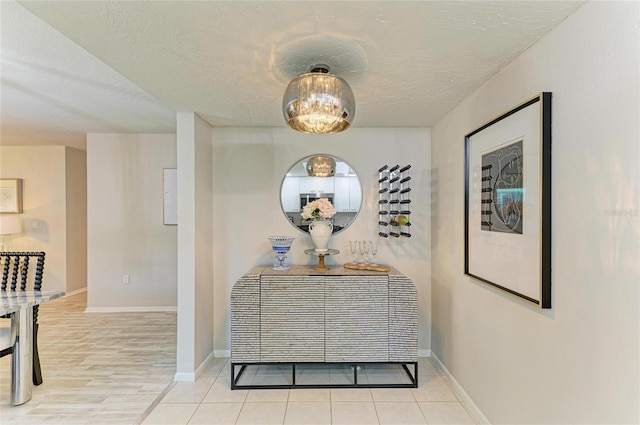1622 Stafford Ln Unit 1205, Sarasota, FL 34232 - interior space featuring wood finished floors, a textured ceiling, and baseboards