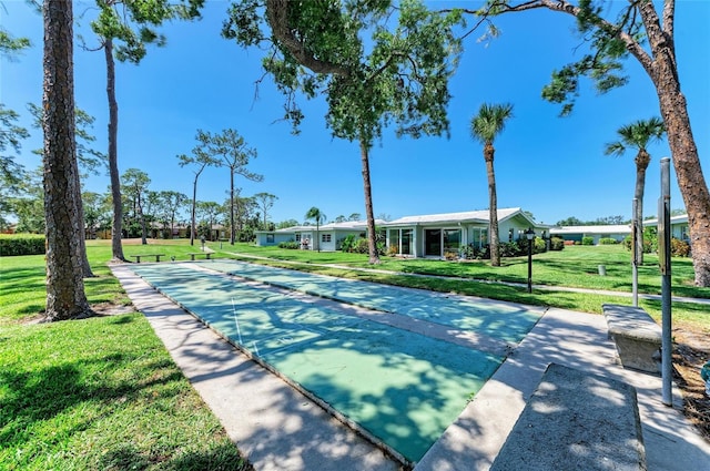 1622 Stafford Ln Unit 1205, Sarasota, FL 34232 - surrounding community with a yard and shuffleboard