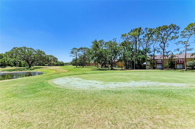 1622 Stafford Ln Unit 1205, Sarasota, FL 34232 - view of property's community with a yard, a water view, and golf course view