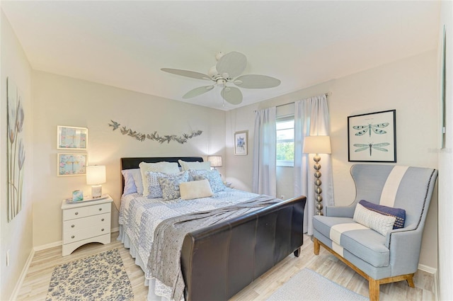 1622 Stafford Ln Unit 1205, Sarasota, FL 34232 - bedroom featuring light wood-style floors, baseboards, and ceiling fan
