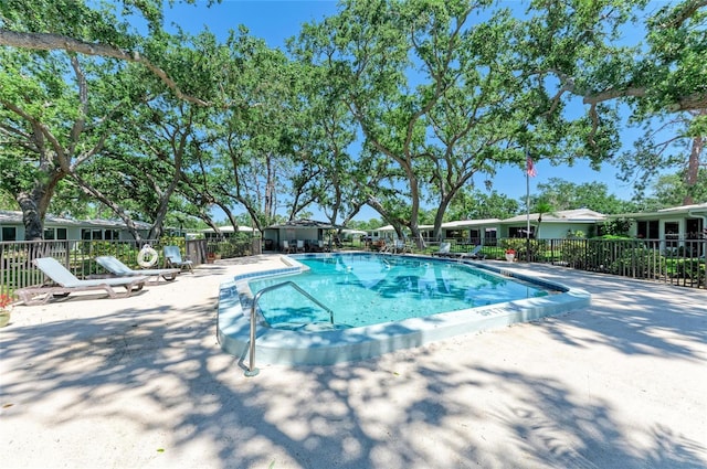 1622 Stafford Ln Unit 1205, Sarasota, FL 34232 - community pool featuring fence and a patio