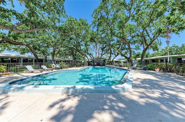 1622 Stafford Ln Unit 1205, Sarasota, FL 34232 - community pool with fence and a patio area