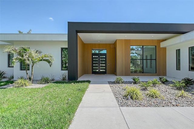 7200 Chameleon Way, Sarasota, FL 34241 - entrance to property featuring a lawn
