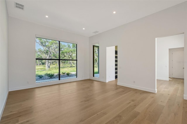 7200 Chameleon Way, Sarasota, FL 34241 - empty room featuring light wood finished floors, baseboards, and recessed lighting