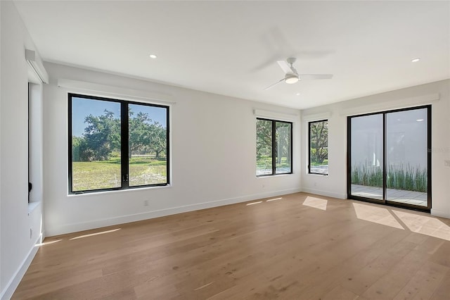7200 Chameleon Way, Sarasota, FL 34241 - unfurnished room featuring light wood-style flooring, baseboards, ceiling fan, and recessed lighting