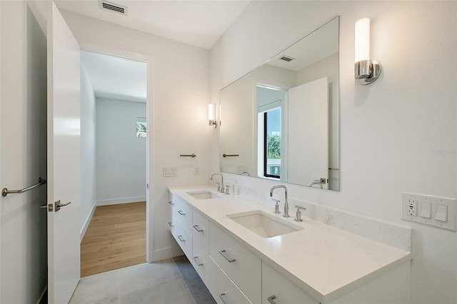 7200 Chameleon Way, Sarasota, FL 34241 - bathroom with double vanity and baseboards