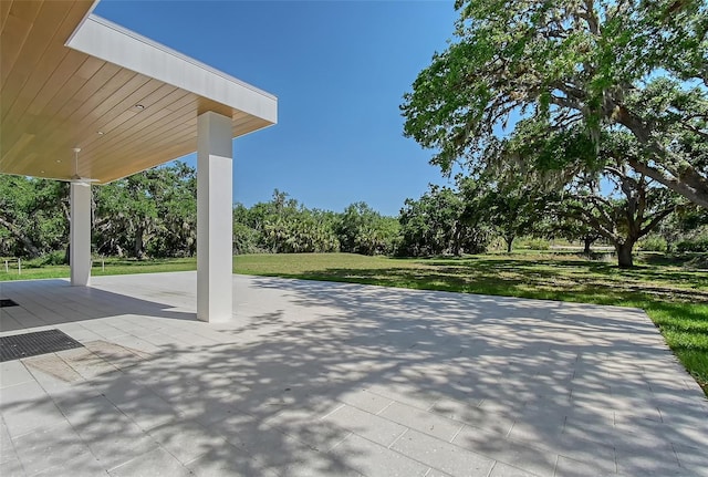 7200 Chameleon Way, Sarasota, FL 34241 - view of patio / terrace featuring view of wooded area