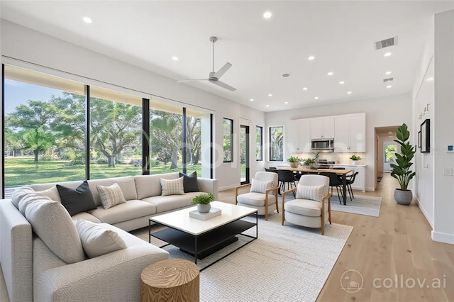 7200 Chameleon Way, Sarasota, FL 34241 - living area with ceiling fan, recessed lighting, light wood-style flooring, and baseboards
