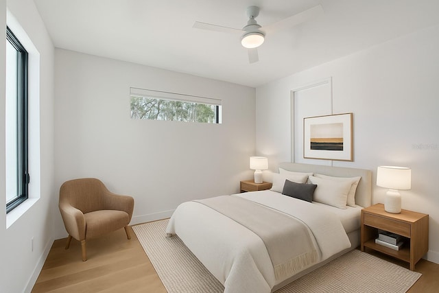 7200 Chameleon Way, Sarasota, FL 34241 - bedroom with light wood finished floors and a ceiling fan