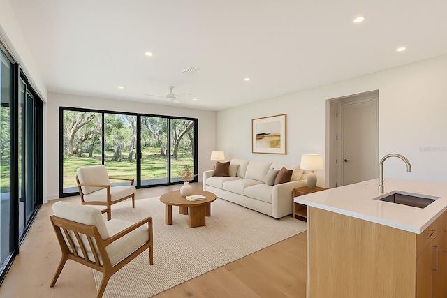 7200 Chameleon Way, Sarasota, FL 34241 - living room with recessed lighting, light wood-type flooring, and ceiling fan