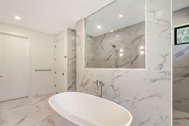 7200 Chameleon Way, Sarasota, FL 34241 - full bathroom with marble tiled flooring, a freestanding bath, recessed lighting, and a marble finish shower