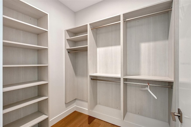 7200 Chameleon Way, Sarasota, FL 34241 - walk in closet with wood finished floors