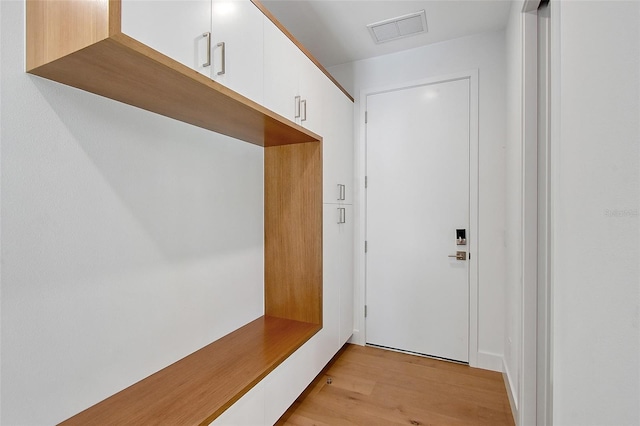 7200 Chameleon Way, Sarasota, FL 34241 - mudroom featuring light wood-style floors