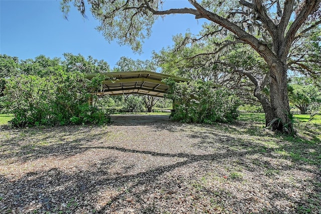 7200 Chameleon Way, Sarasota, FL 34241 - view of yard featuring a carport