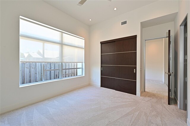 221 Cosmopolitan Ct, Sarasota, FL 34236 - unfurnished bedroom featuring recessed lighting, carpet, visible vents, and baseboards