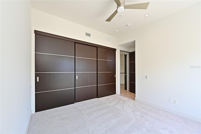 221 Cosmopolitan Ct, Sarasota, FL 34236 - unfurnished bedroom featuring baseboards, visible vents, carpet floors, and ceiling fan