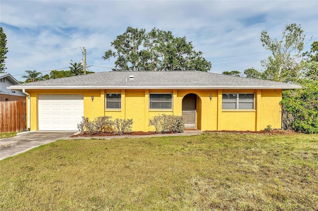 2151 Upton Ave, Sarasota, FL 34232 - ranch-style home with driveway, a front yard, fence, an attached garage, and stucco siding
