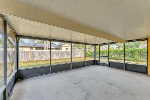 2151 Upton Ave, Sarasota, FL 34232 - unfurnished sunroom featuring beamed ceiling