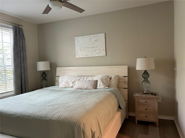 4166 Central Sarasota Pkwy Unit 535, Sarasota, FL 34238 - bedroom with wood finished floors, baseboards, and a ceiling fan