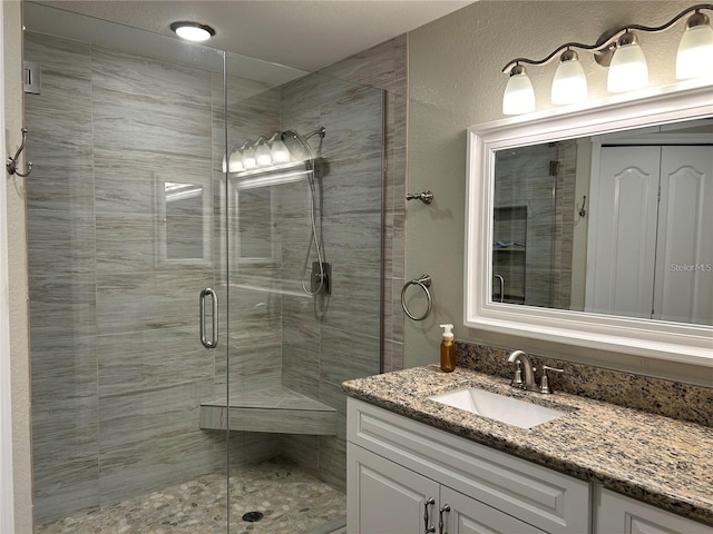 4166 Central Sarasota Pkwy Unit 535, Sarasota, FL 34238 - bathroom featuring a stall shower and vanity