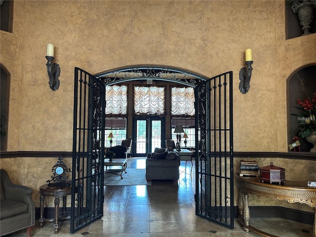 4166 Central Sarasota Pkwy Unit 535, Sarasota, FL 34238 - entrance foyer with arched walkways and french doors