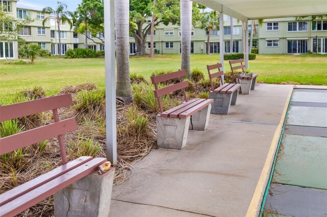 4885 1st St NE Unit 308, Saint Petersburg, FL 33703 - view of property's community featuring a residential view and a yard