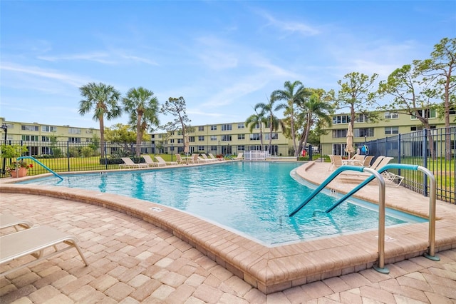 4885 1st St NE Unit 308, Saint Petersburg, FL 33703 - pool with a residential view, fence, and a patio