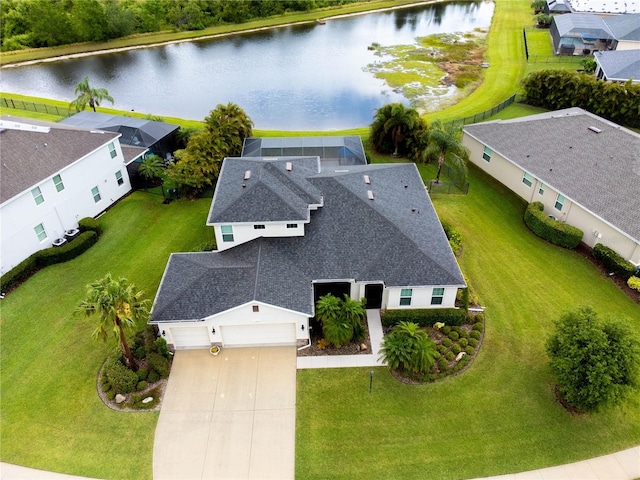 drone / aerial view with a water view