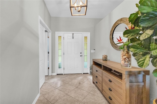 2918 130th Ave E, Parrish, FL 34219 - foyer entrance with a chandelier and light tile patterned floors