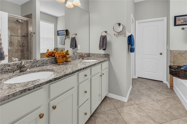 2918 130th Ave E, Parrish, FL 34219 - full bath featuring double vanity, a shower stall, and tile patterned flooring