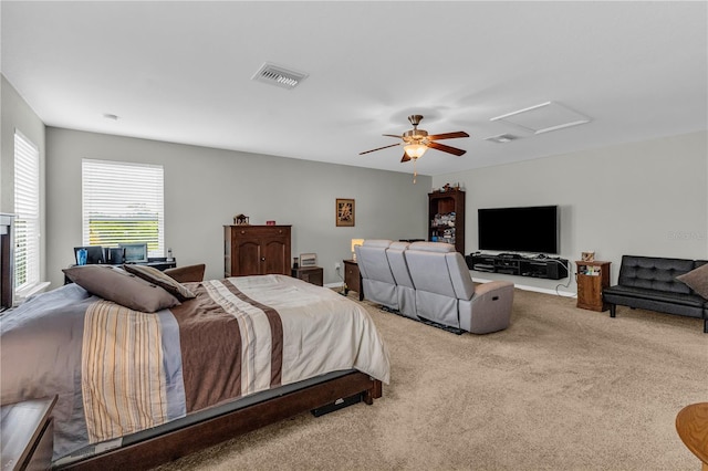 2918 130th Ave E, Parrish, FL 34219 - bedroom with attic access, carpet, and ceiling fan