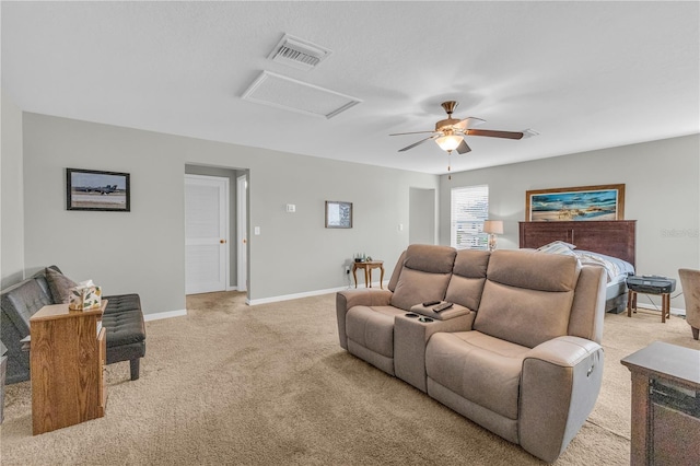 2918 130th Ave E, Parrish, FL 34219 - living area featuring attic access, light colored carpet, and a ceiling fan