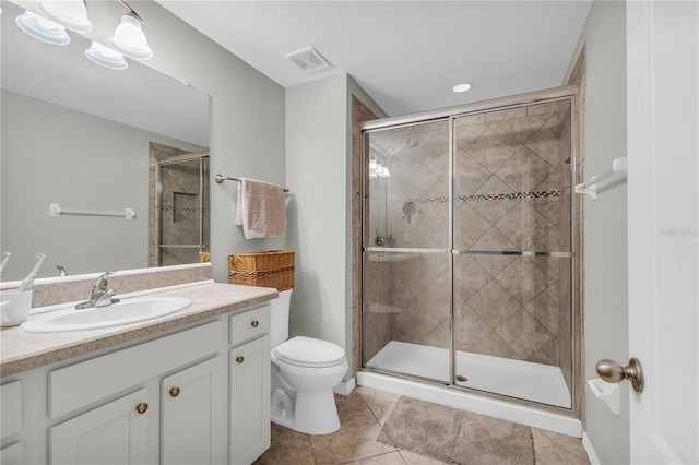 2918 130th Ave E, Parrish, FL 34219 - full bathroom featuring vanity, tile patterned floors, and a shower stall