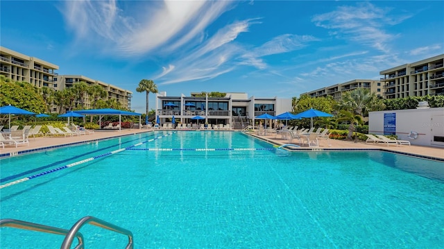 community pool with a patio
