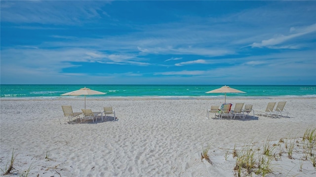 property view of water featuring a beach view