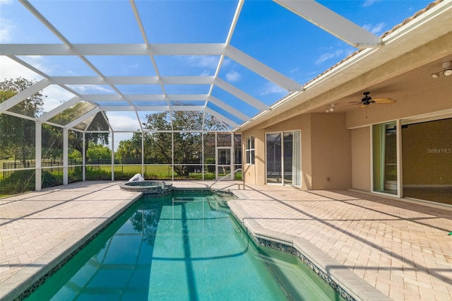 244 Dove Trl, Bradenton, FL 34212 - view of swimming pool with a patio, a pool with connected hot tub, a ceiling fan, and a lanai