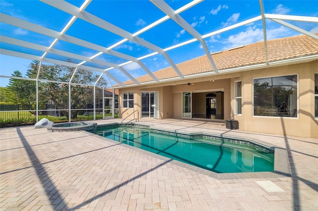244 Dove Trl, Bradenton, FL 34212 - view of swimming pool with a patio, ceiling fan, a lanai, and a pool with connected hot tub
