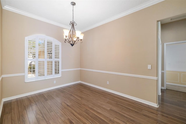 244 Dove Trl, Bradenton, FL 34212 - unfurnished room with dark wood-style floors, a chandelier, and ornamental molding
