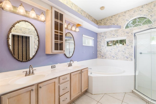 244 Dove Trl, Bradenton, FL 34212 - bathroom with double vanity, a bath, tile patterned flooring, a stall shower, and healthy amount of natural light