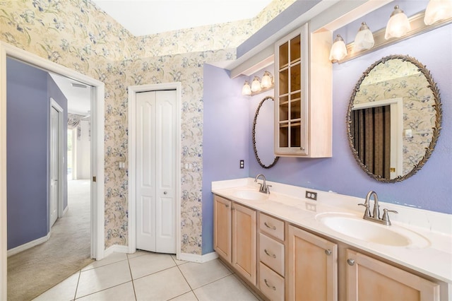 244 Dove Trl, Bradenton, FL 34212 - full bath featuring tile patterned floors, double vanity, a closet, and wallpapered walls