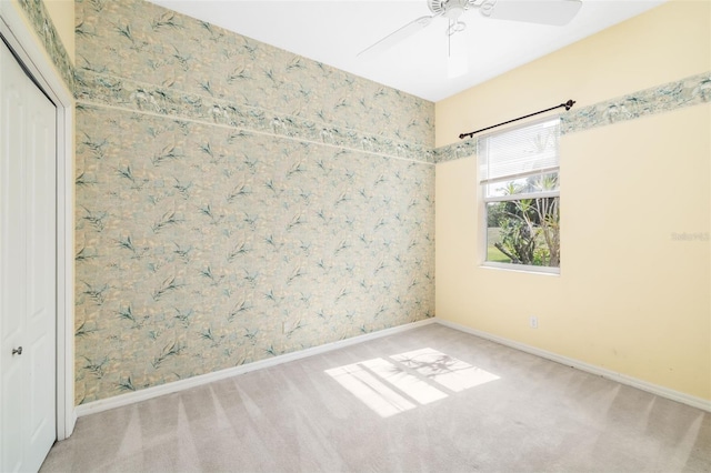 244 Dove Trl, Bradenton, FL 34212 - carpeted spare room featuring baseboards and ceiling fan