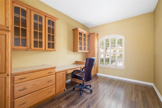 244 Dove Trl, Bradenton, FL 34212 - home office with built in study area and dark wood-style floors