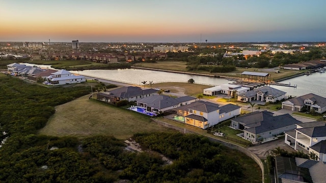 1613 4th St E, Palmetto, FL 34221 - aerial perspective of suburban area featuring a large body of water