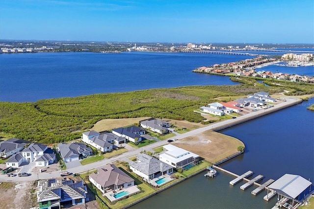 1613 4th St E, Palmetto, FL 34221 - aerial view of residential area featuring a nearby body of water